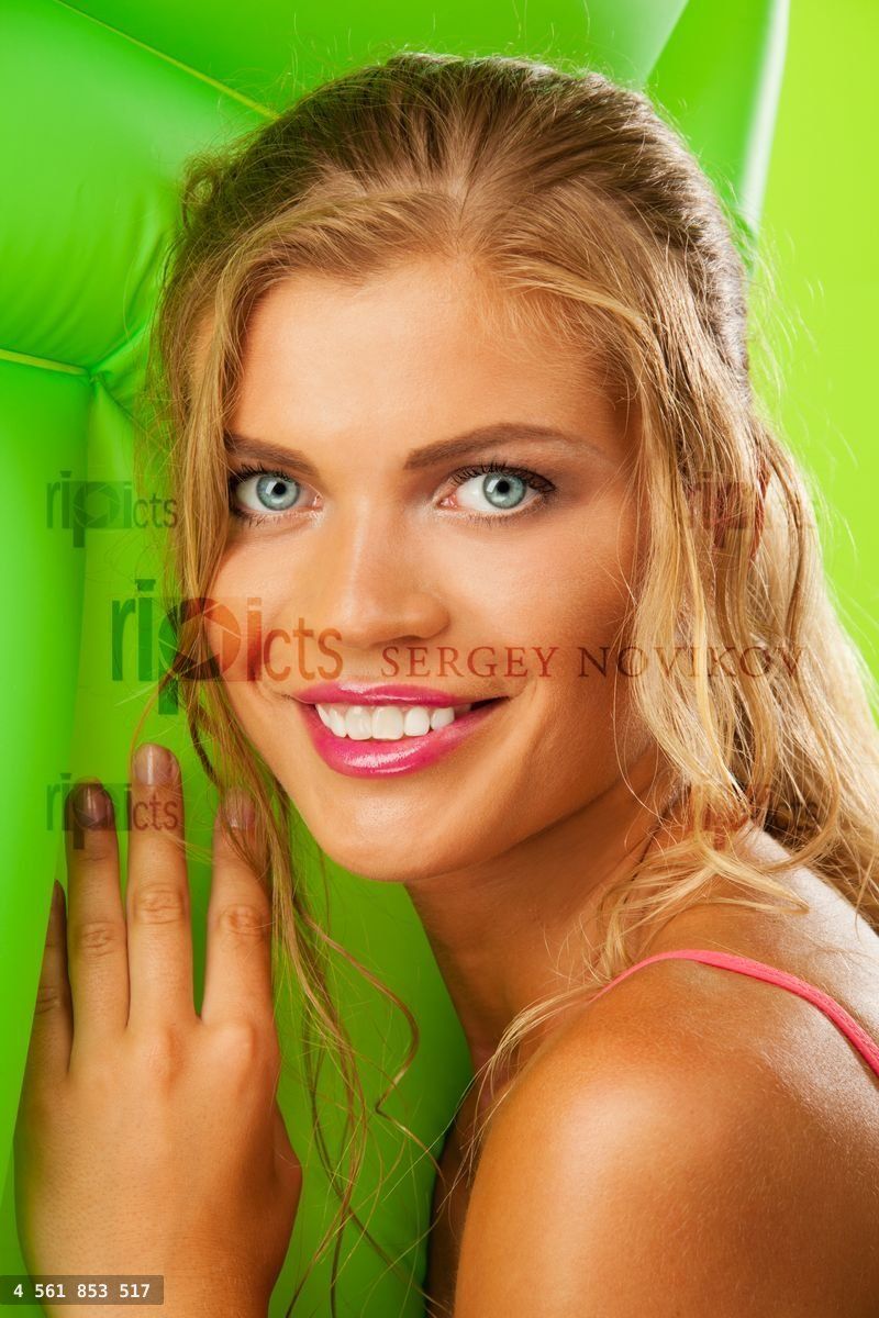 happy blonde girl with mattress