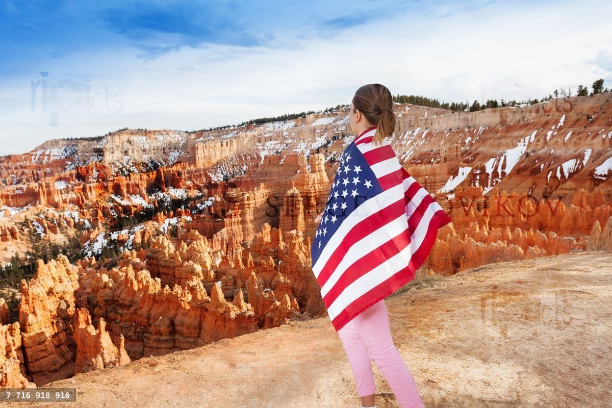 Woman with USA flag, Bryce Canyon National Park