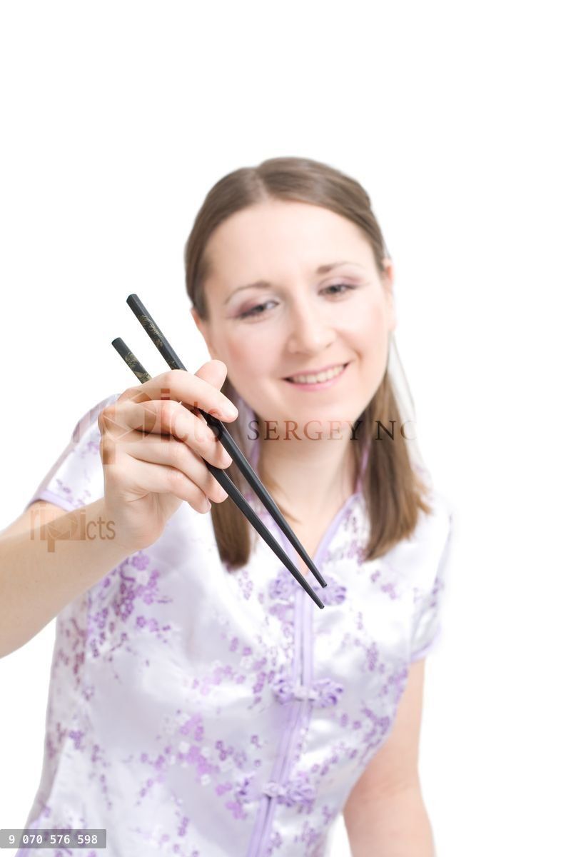 Woman with chopsticks for sushi