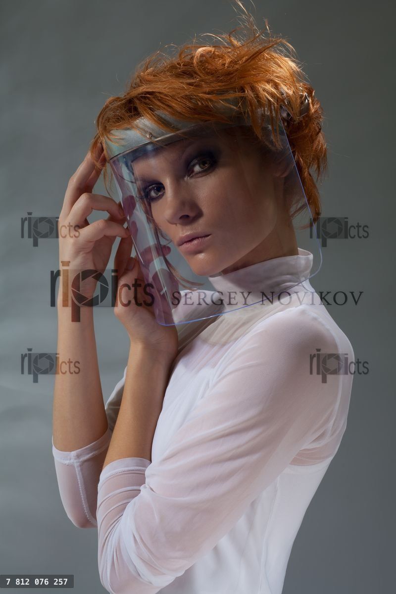 Futuristic woman in glass mask