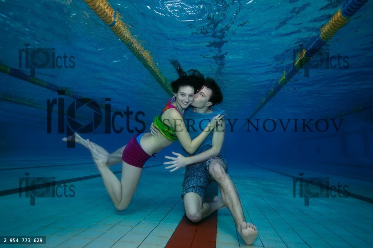 Fun and love underwater shoot of couple