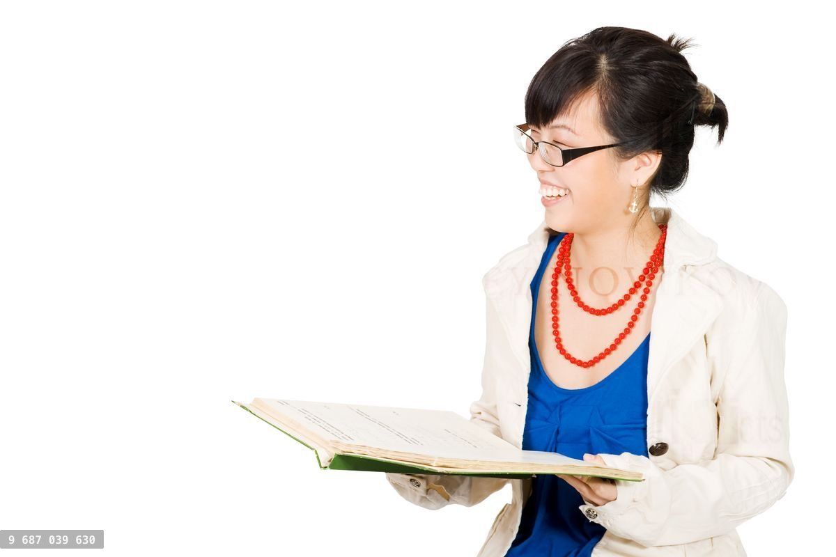 Woman laughing while reading