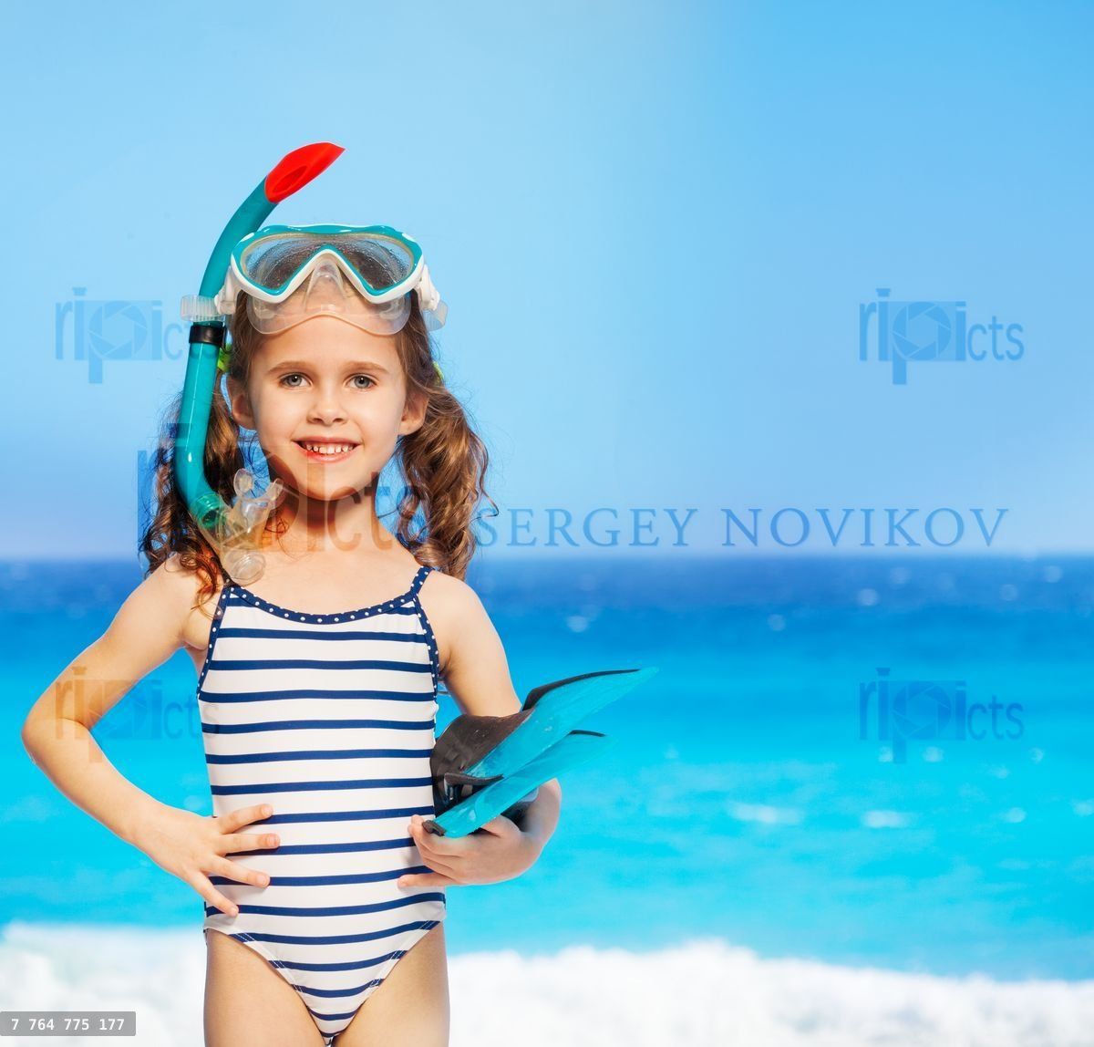 Funny litter diver with her diving equipment