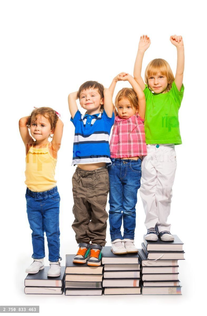 Four kids sitting on the books