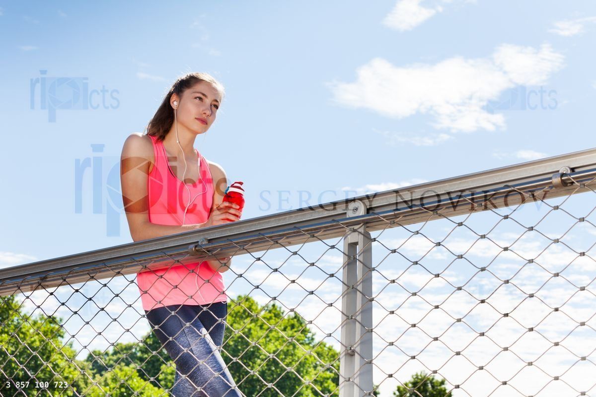 Young woman resting after running training outdoor