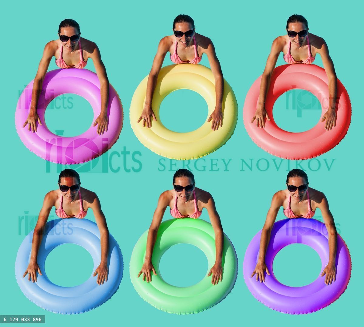 Women with different color inflatable buoy on blue