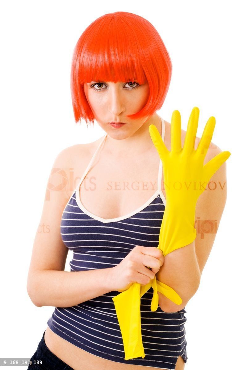 woman in red wig and yellow gloves