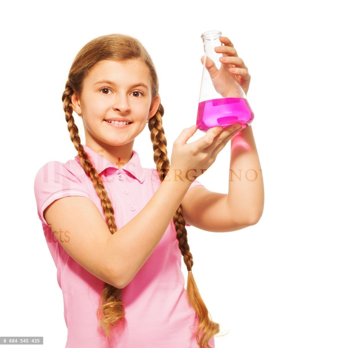 Young scientist pouring chemicals at the flask