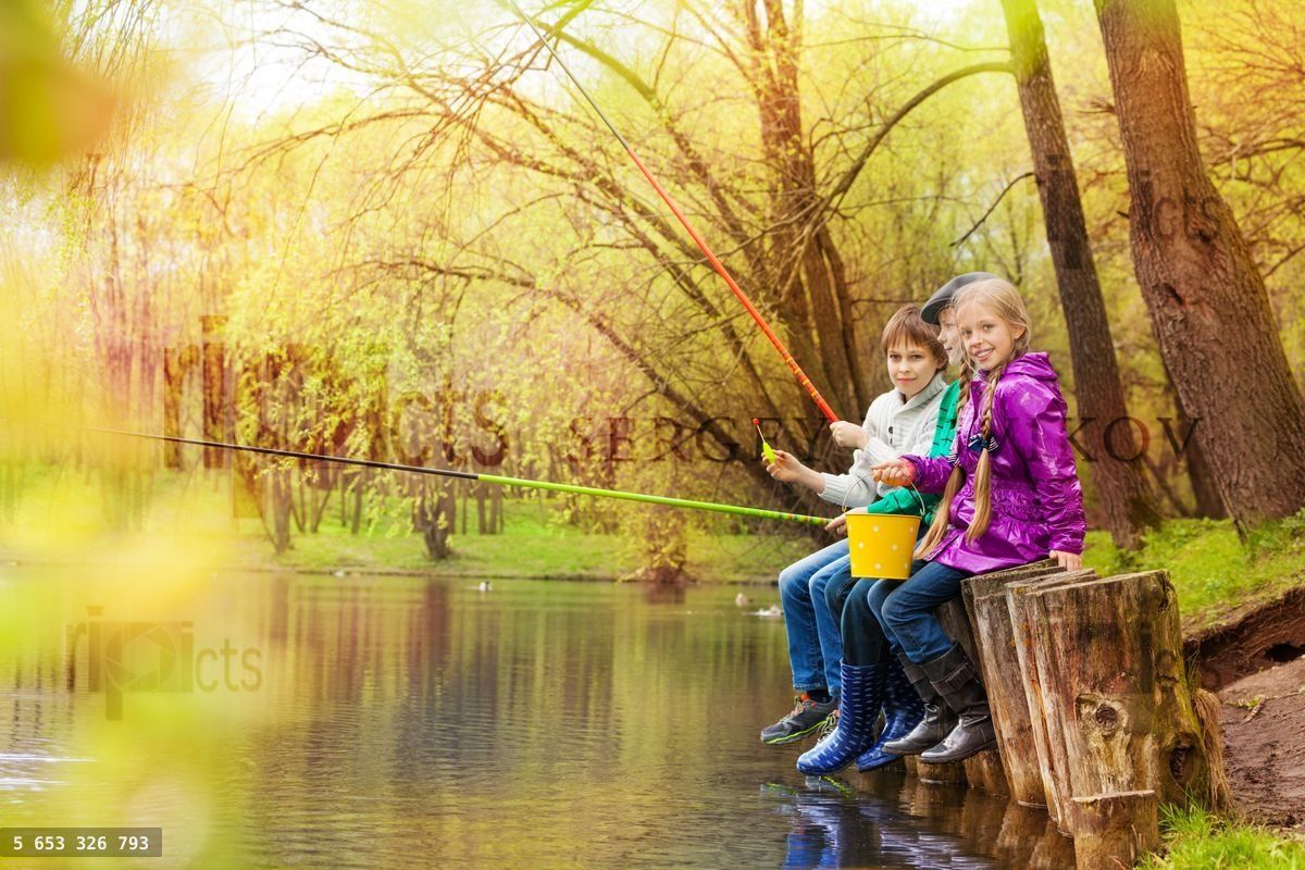 Friends fishing together with colorful fishrods