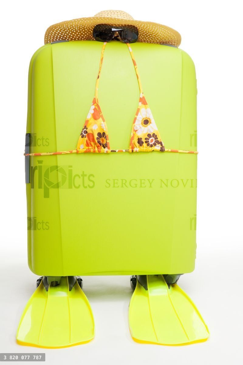 Woman's suitcase ready for the beach