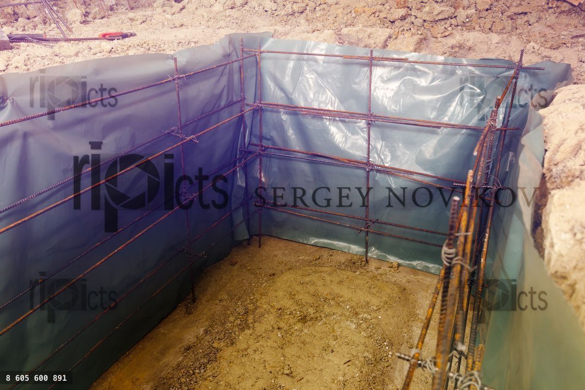 Framework of metal bars prepared for cellar base