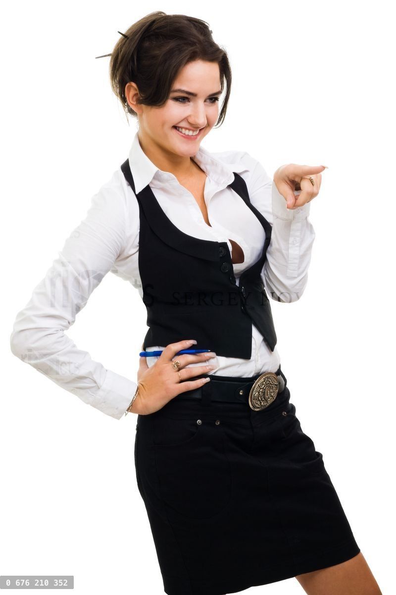 Woman pointing with finger and laughing wearing formal clothes