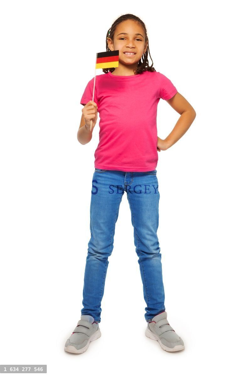 Confident German language learner holding flag