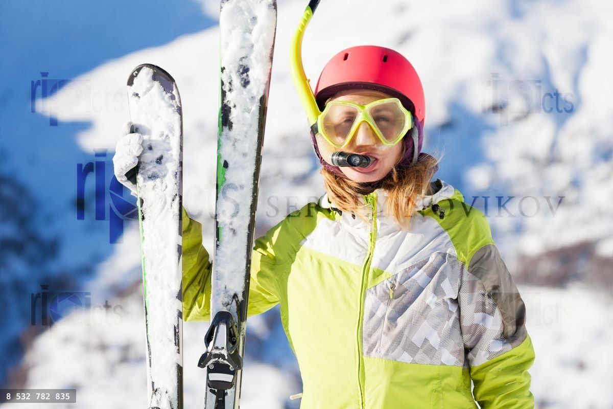 Funny portrait of skier in diving mask and snorkel