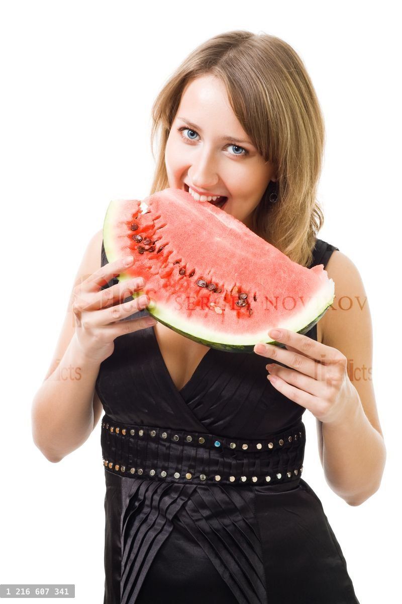 woman eat watermelon and smiling