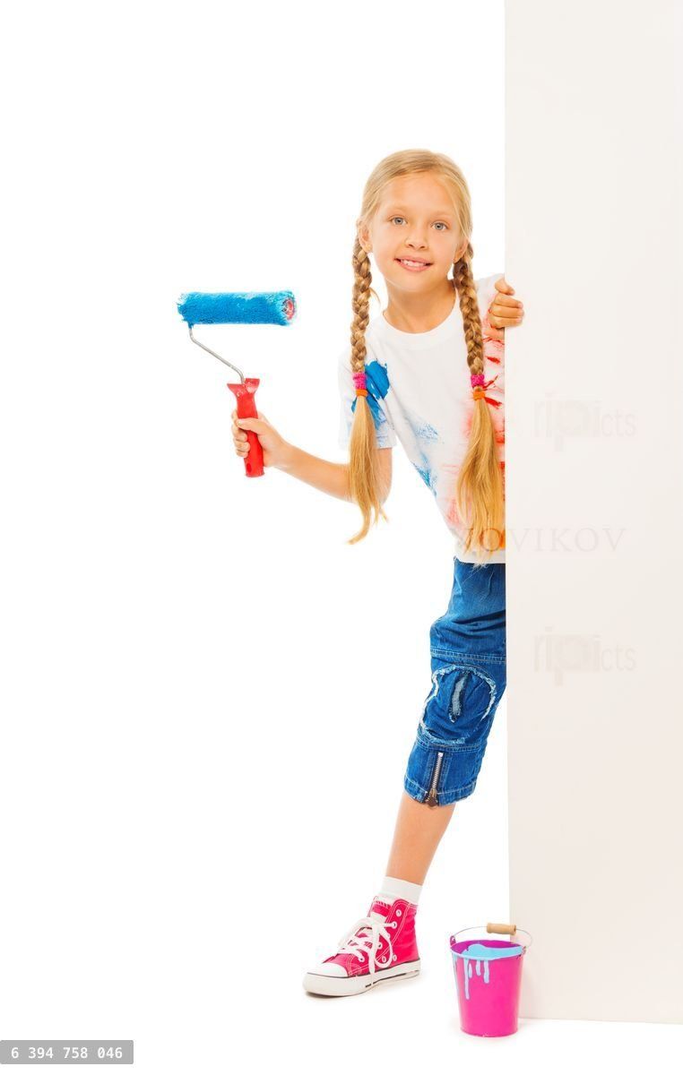 Young beautiful girl stands behind the corner
