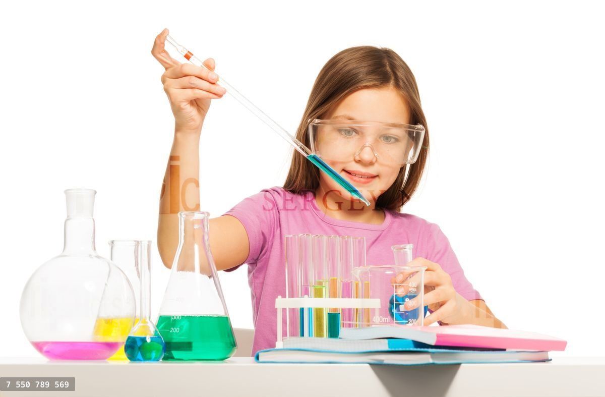 Young girl doing her chemical test in laboratory