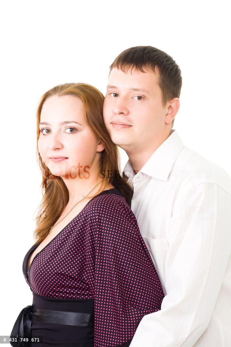 Young couple standing in profile