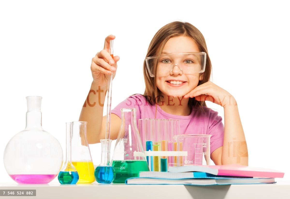 Young pupil studying chemistry in the laboratory