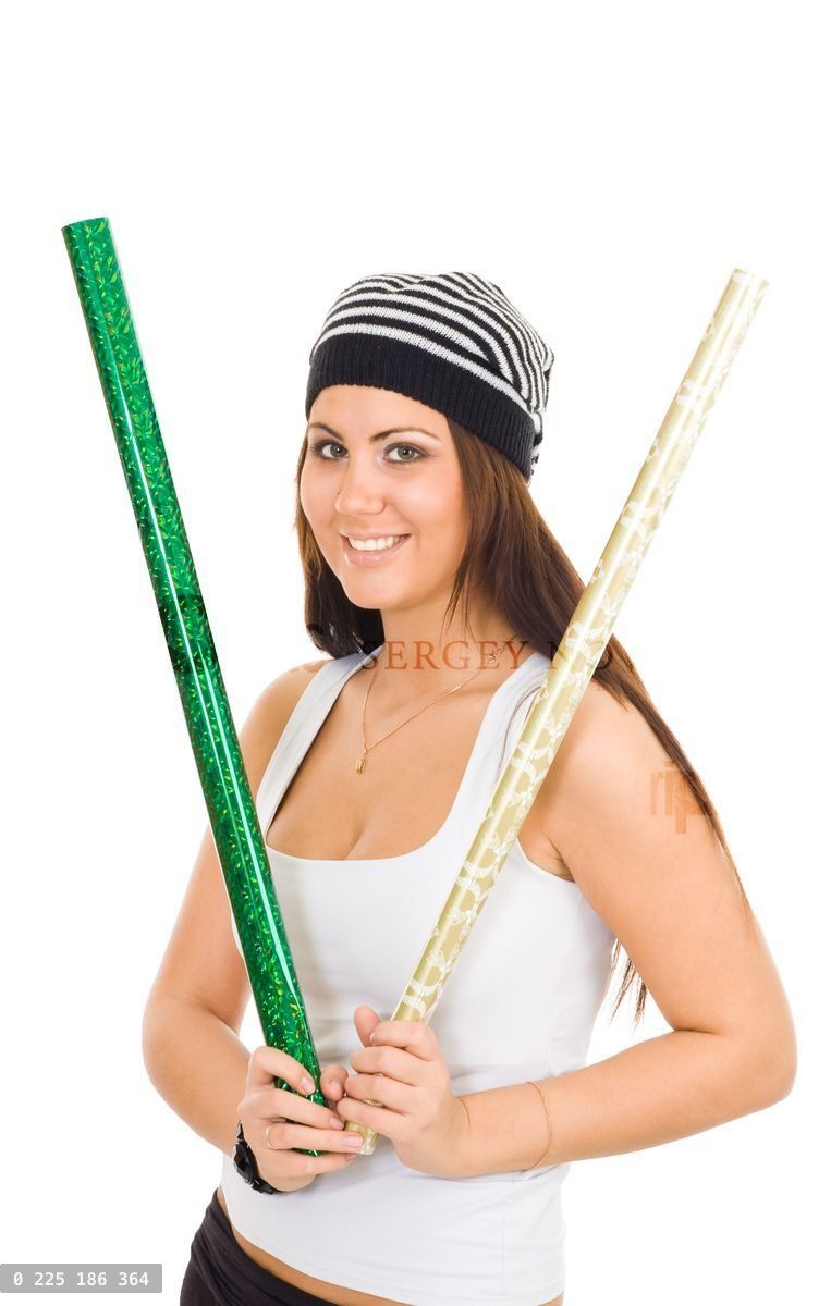 woman holding goold and greend wrapping paper rols