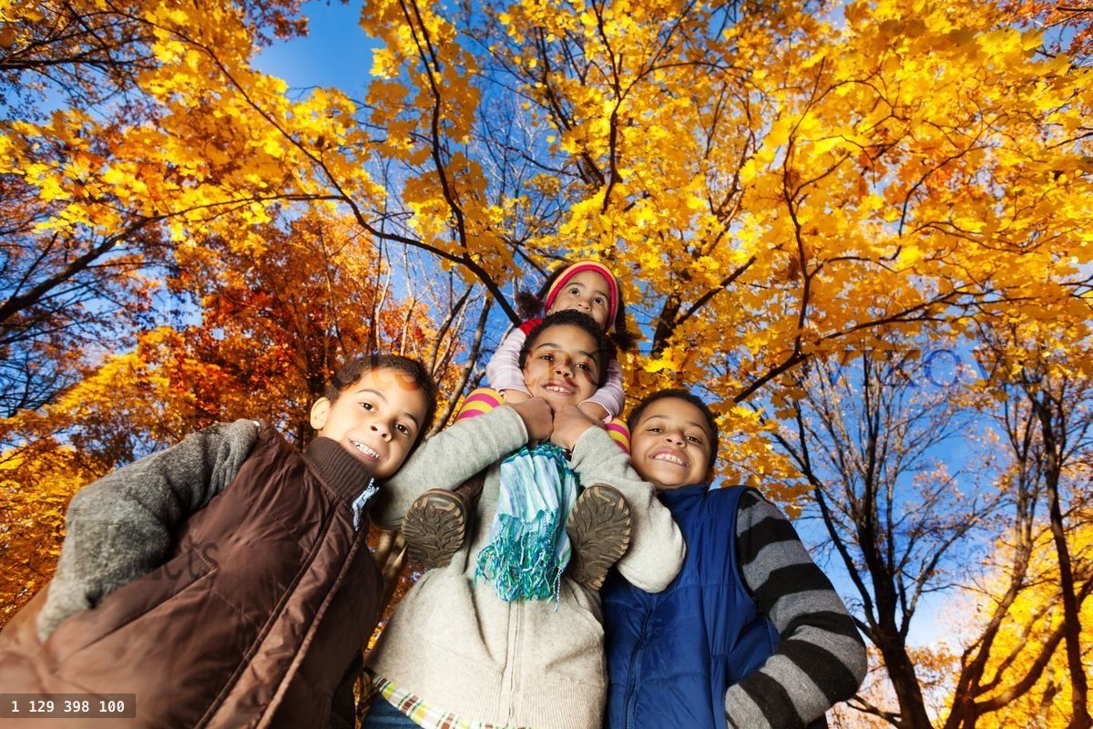 Group of kids in autumn park