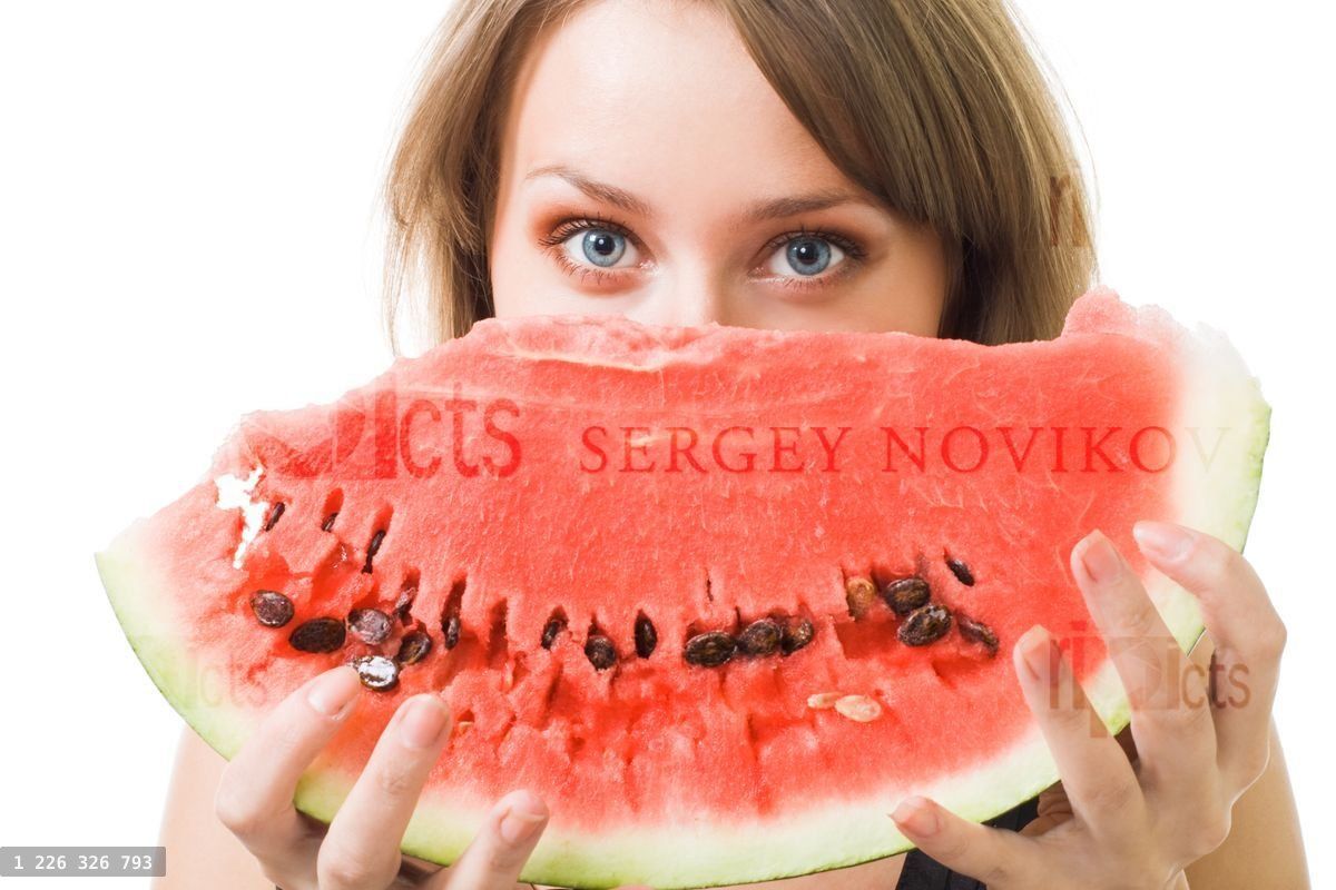 woman stare behind watermelon
