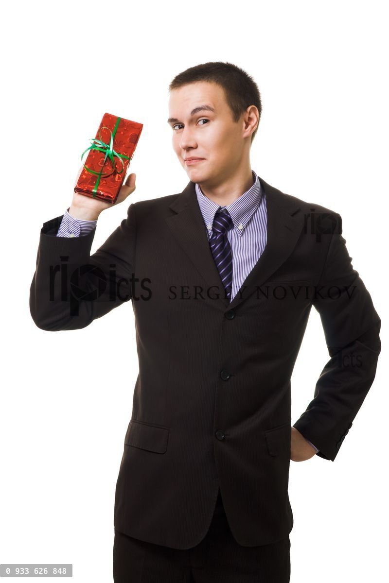 Young man hold small gift