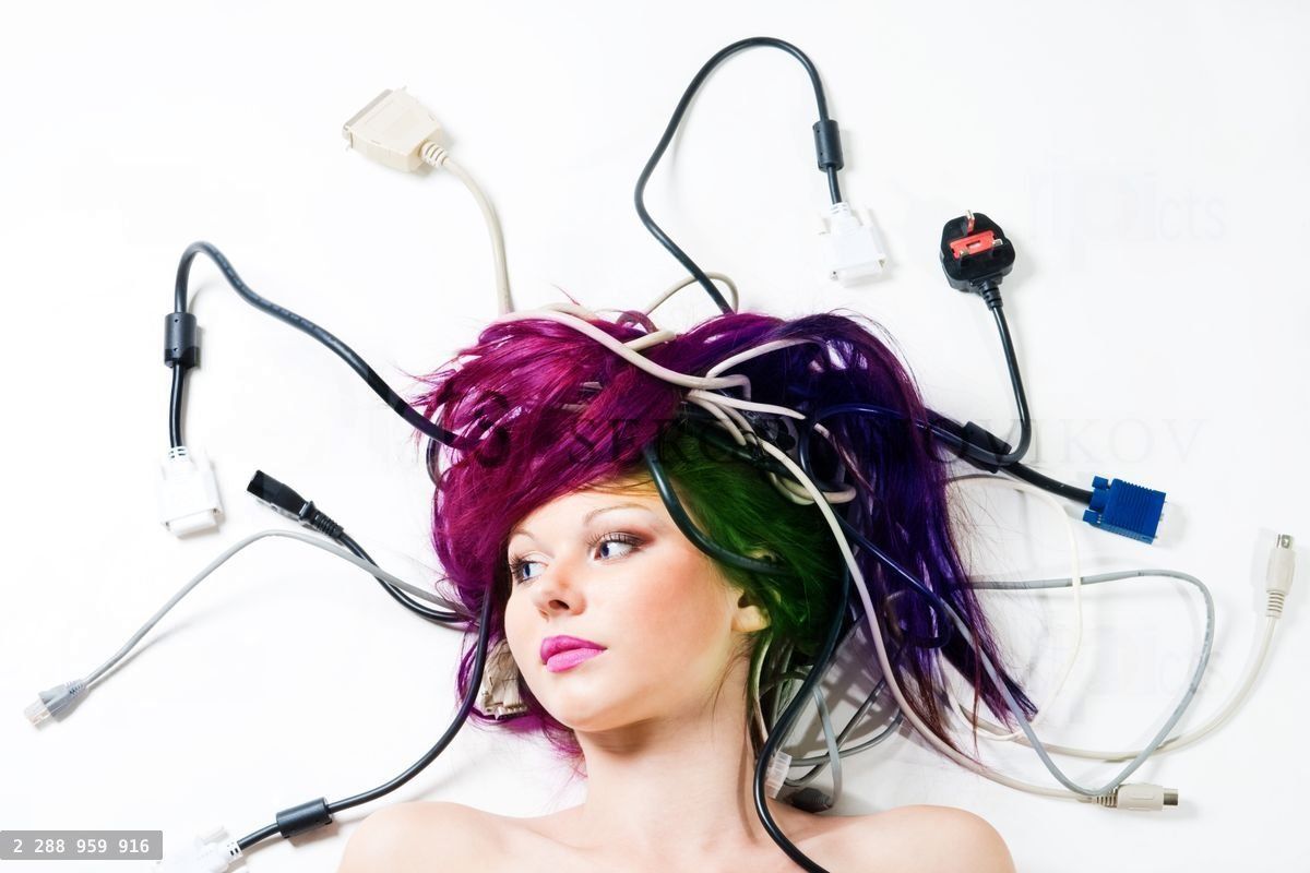 Woman lay on the floor with wires and plugs