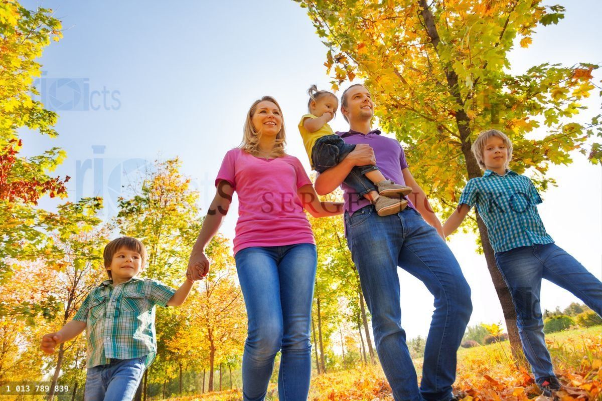 View from below of happy family walking