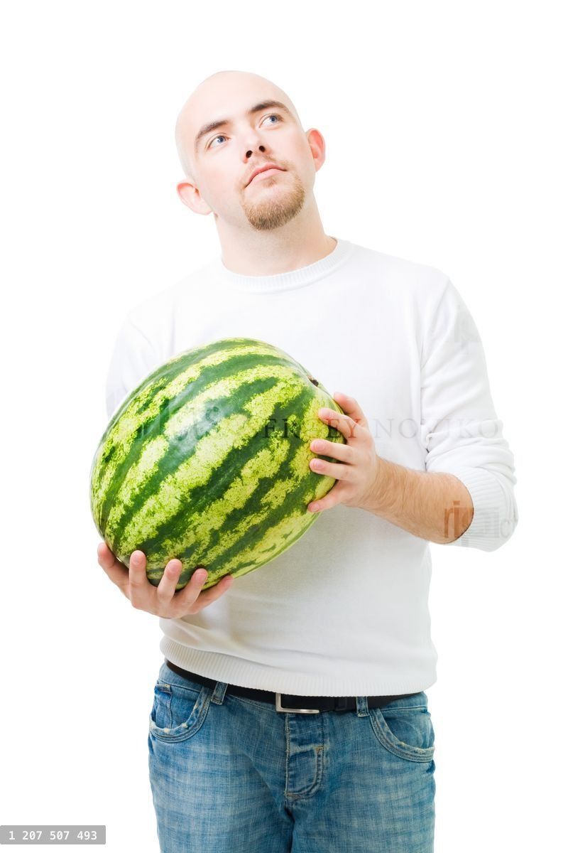Young man hold watermelon
