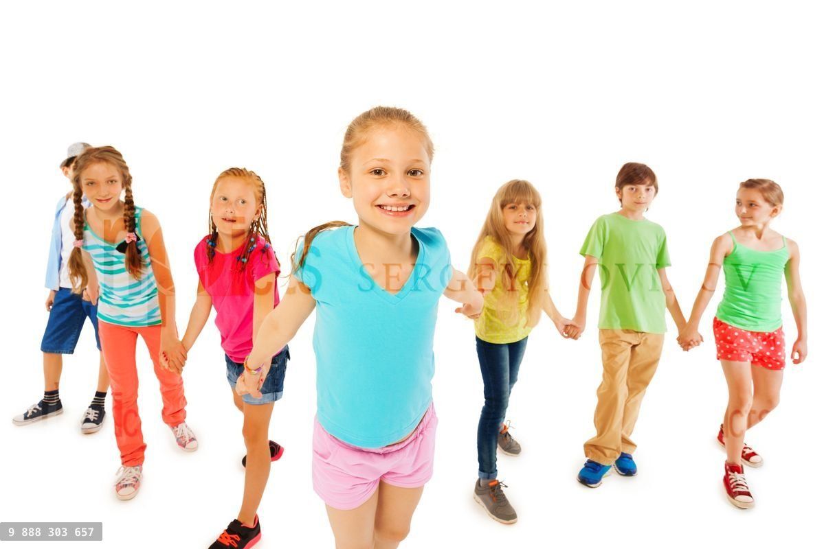 Many kids with happy girl hold hands and pull