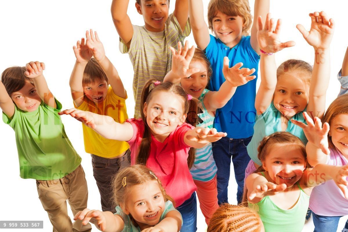 Crowd of kids rise hands up to camera