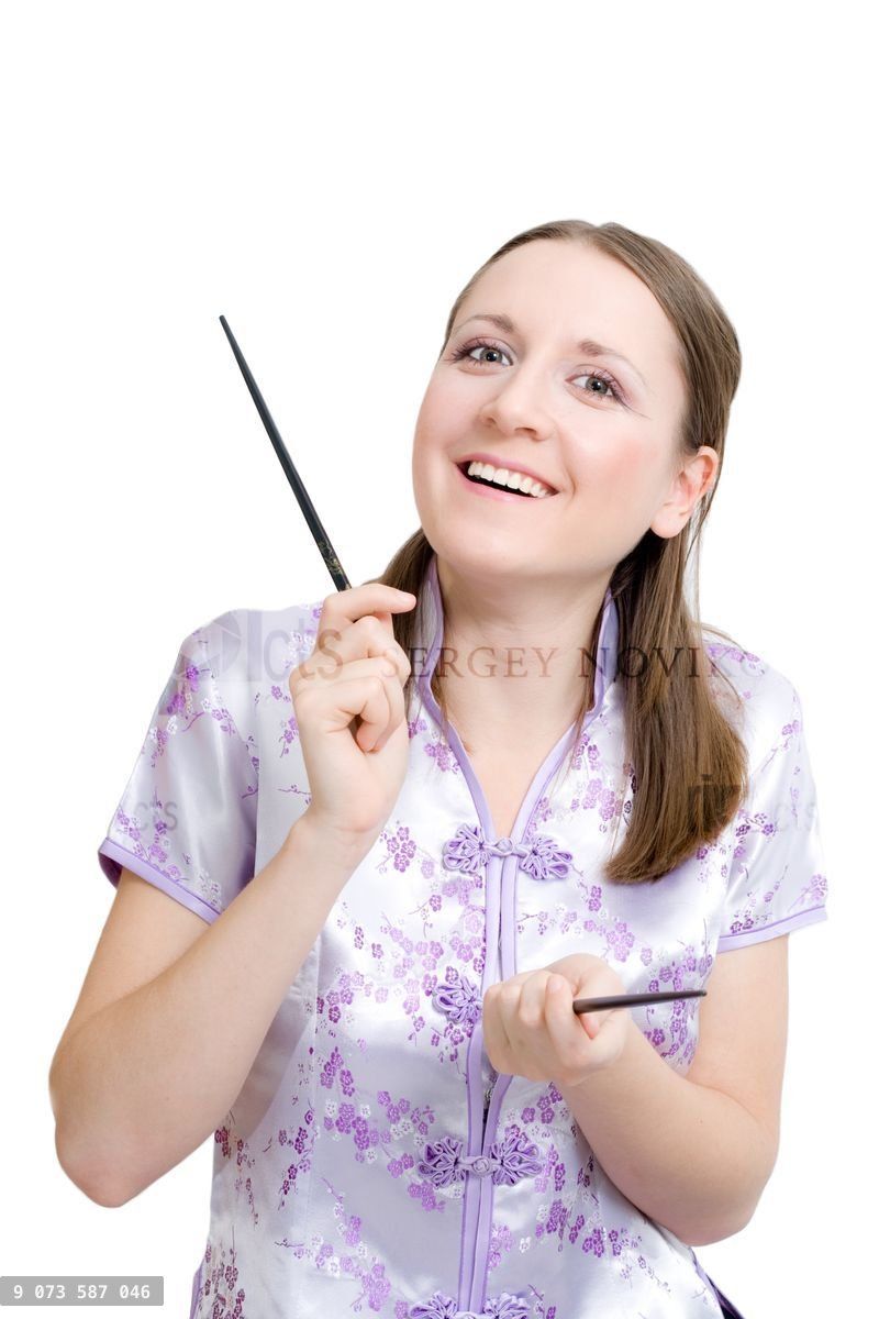 Woman with chopsticks for sushi