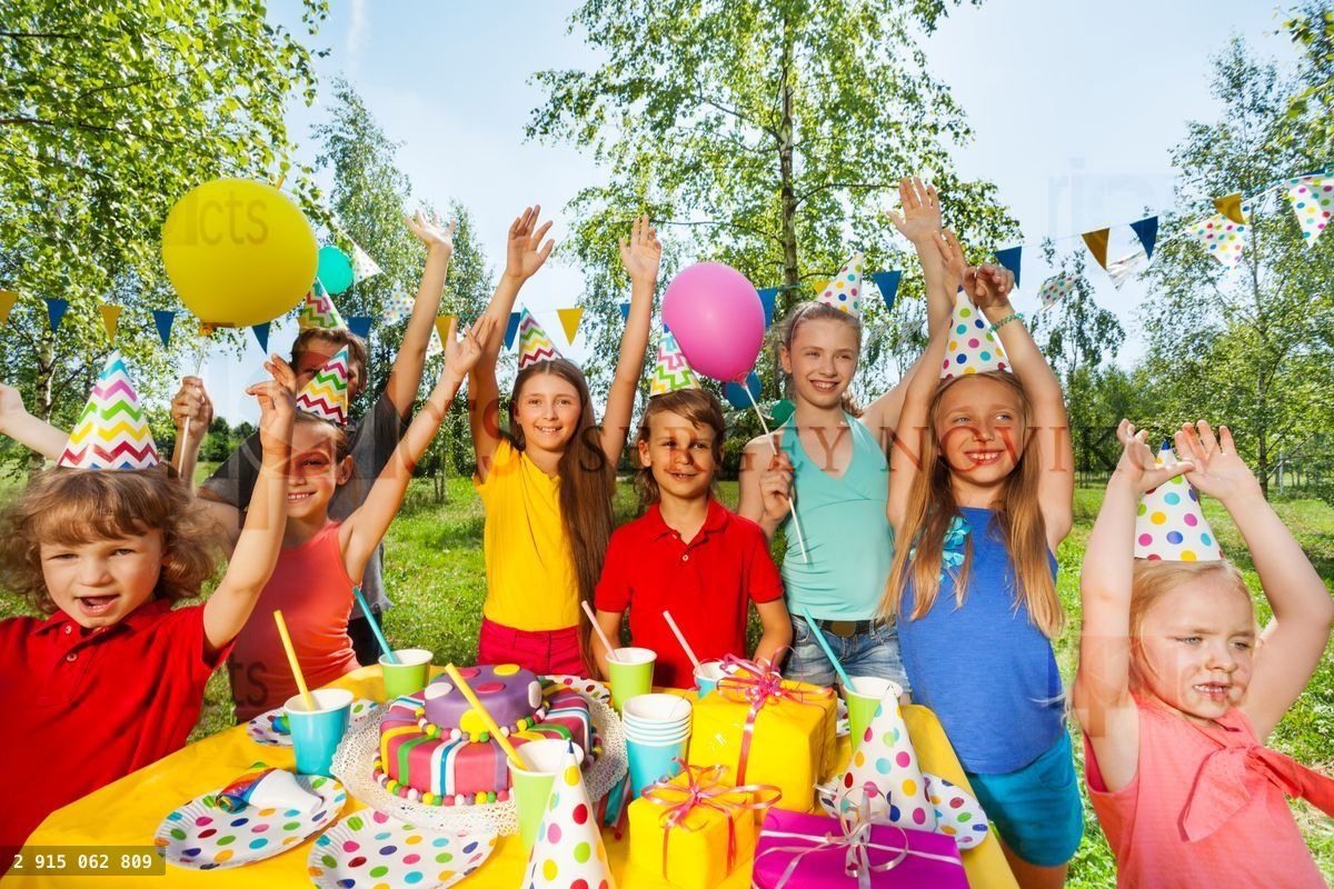 Big group of children at outdoor birthday party