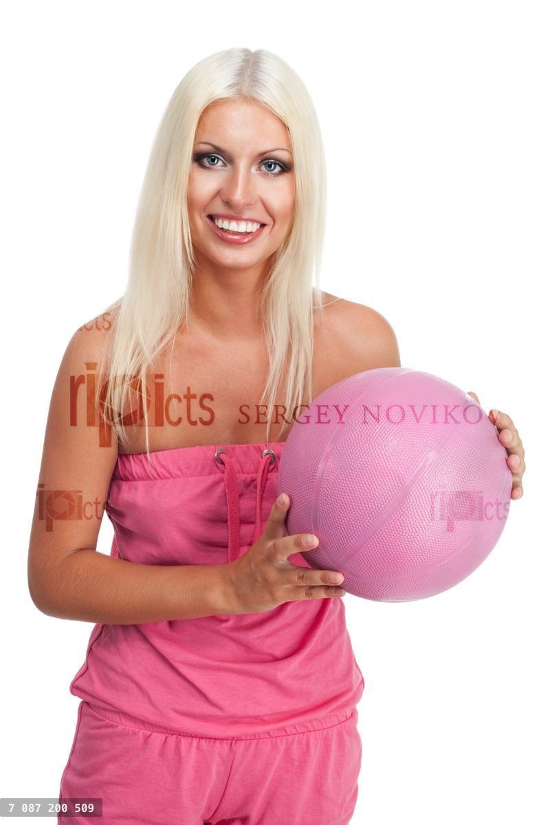 Woman hold pink basketball ball