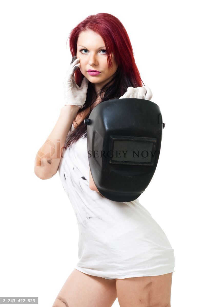 woman stand and hold welding mask