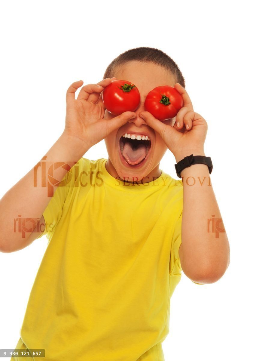 Crazy boy with tomatoes