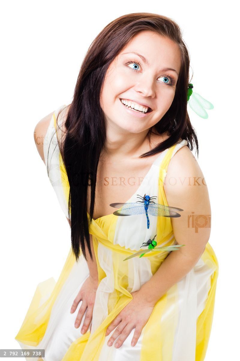 Woman in light dress with dragonflies on it