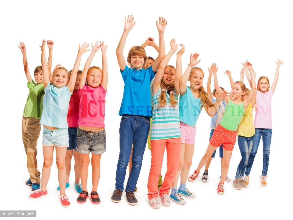 Group of happy kids with raised hands on white