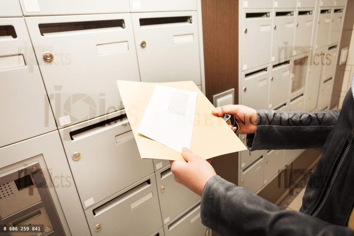 Woman's hands holding envelopes with copy space