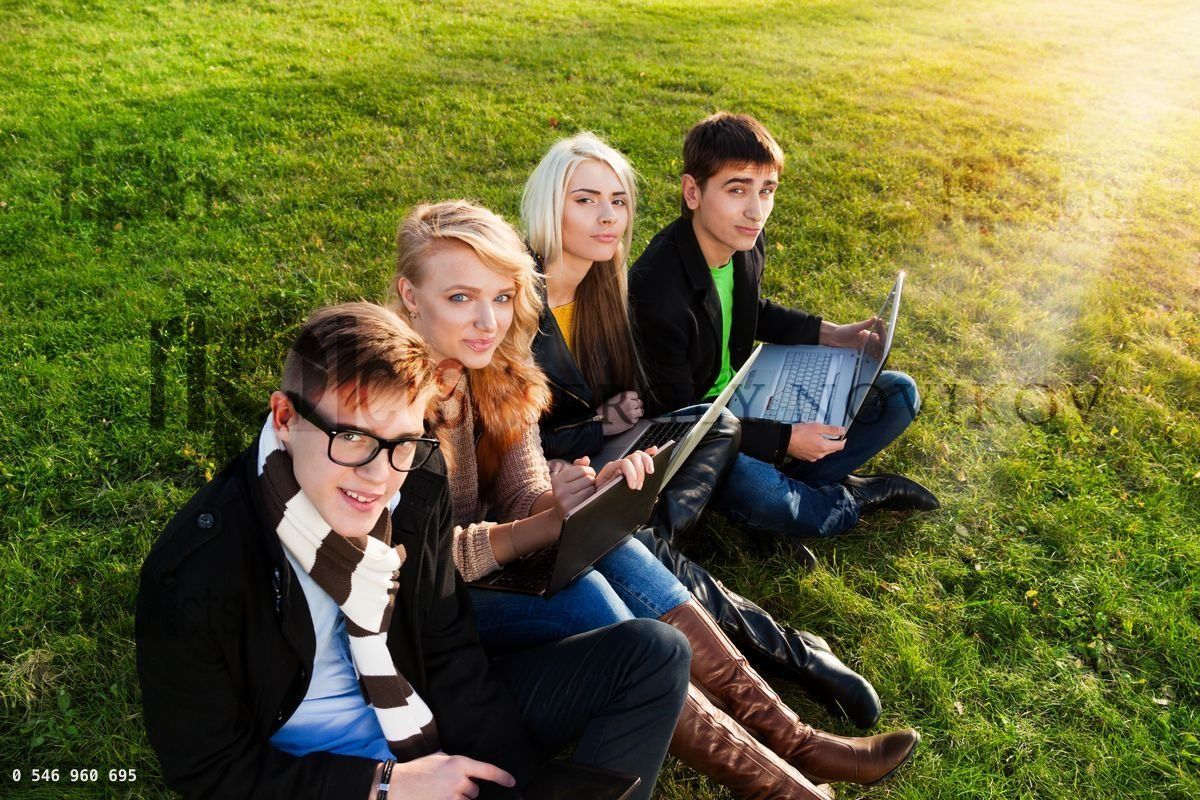 Four students with laptop