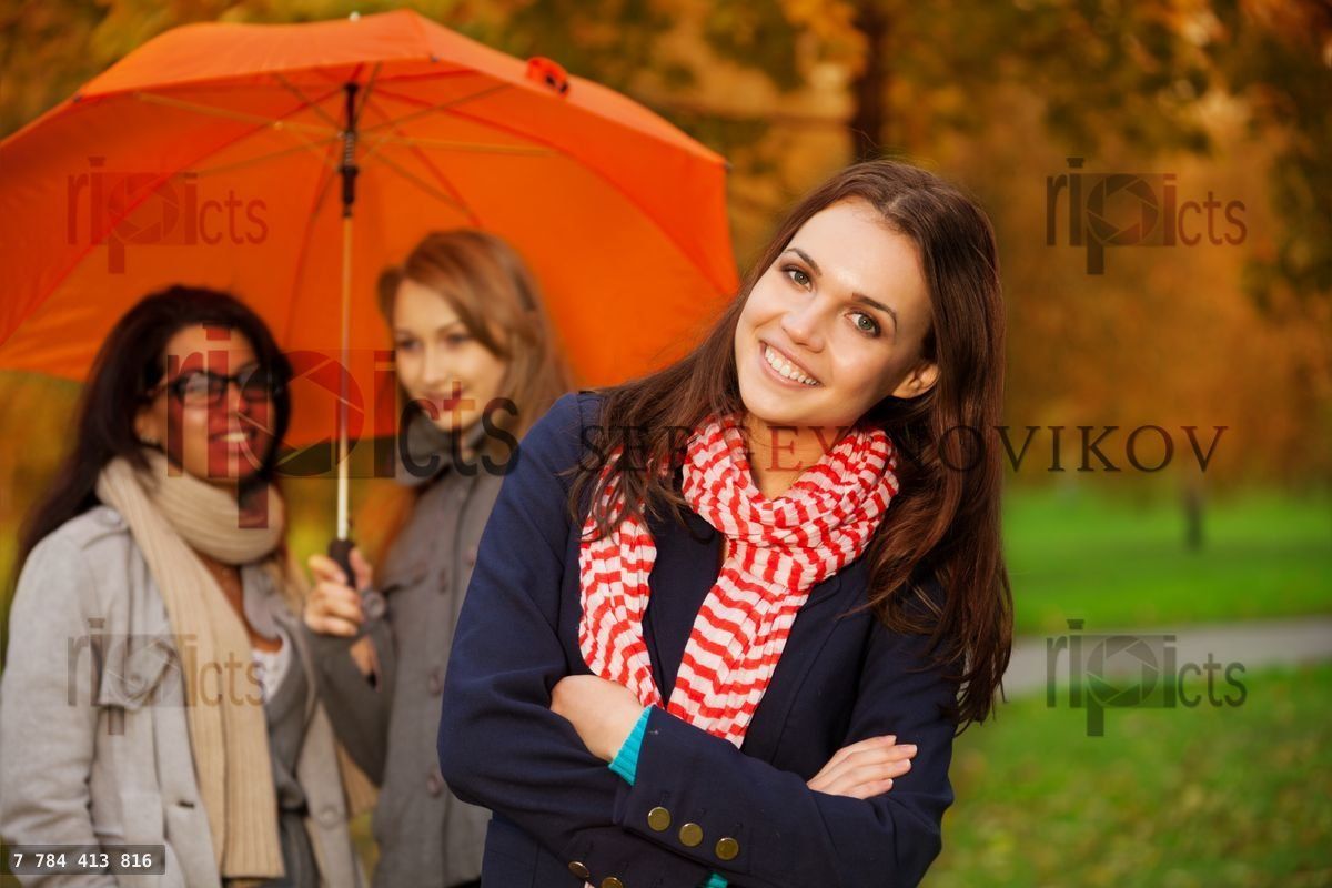 Friends in autumn park