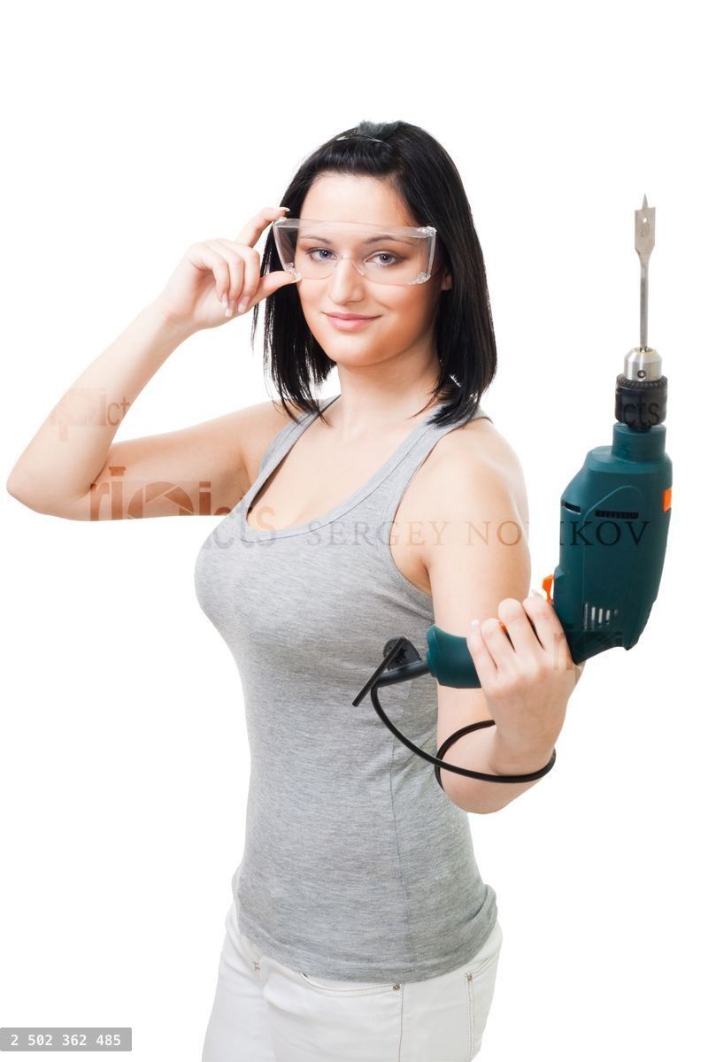 Woman with drill for wood