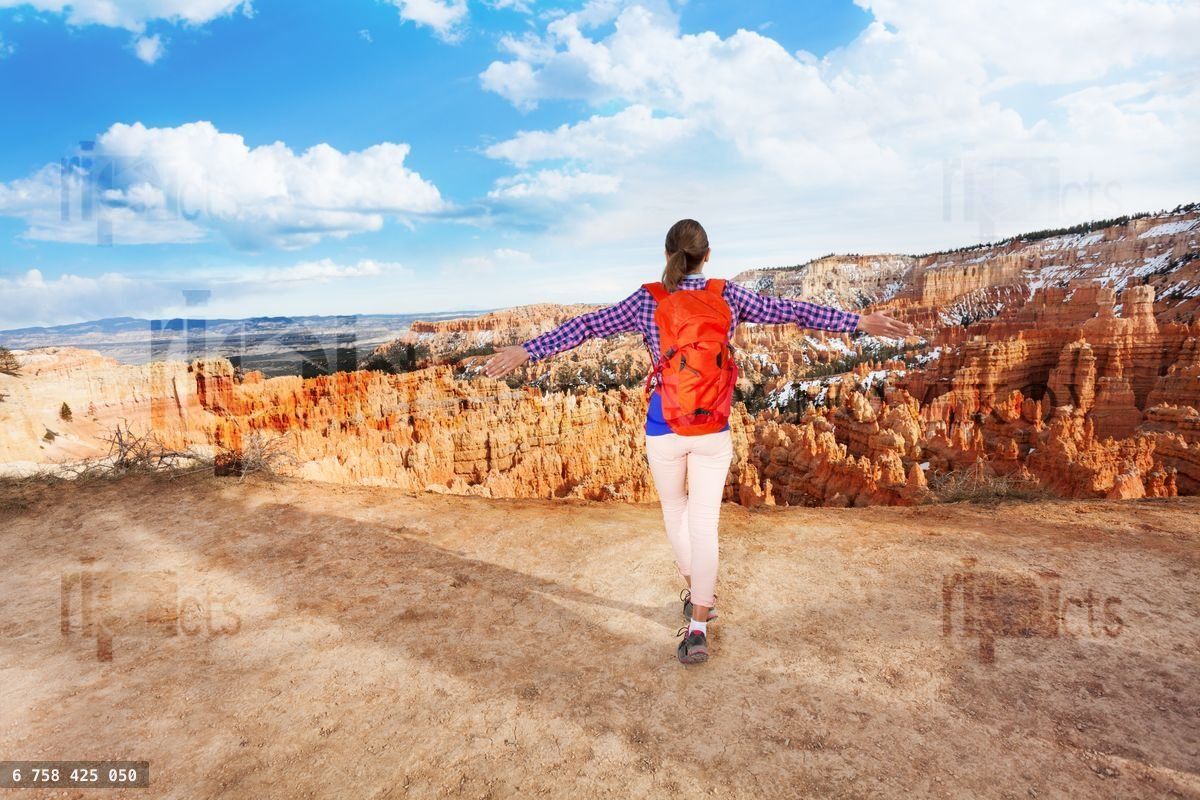 Young woman happy to see Bryce Canyon