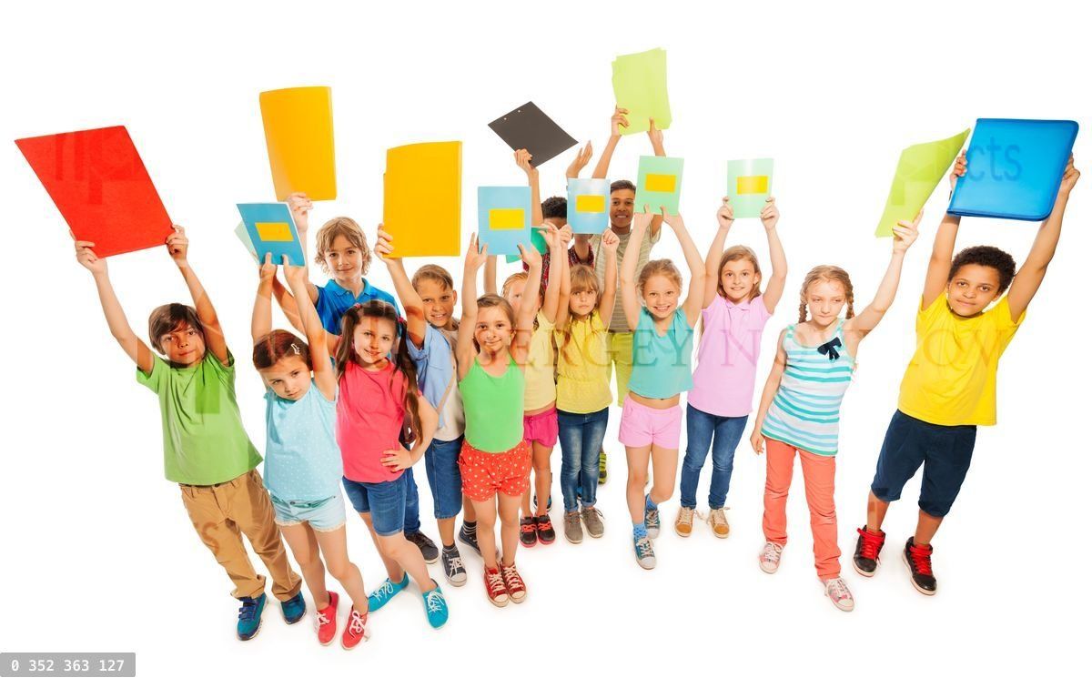 Large diverse group of kids lifting up textbooks