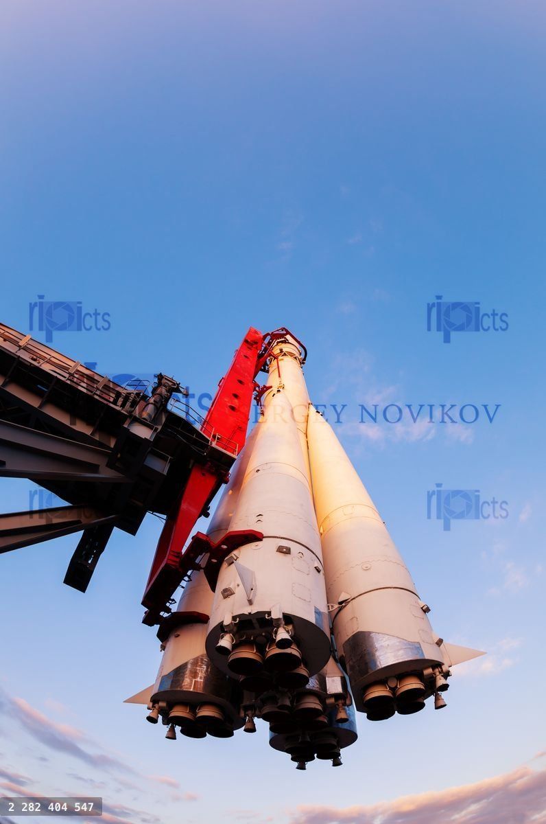 Big space rocket hang on the launchpad stand over sky