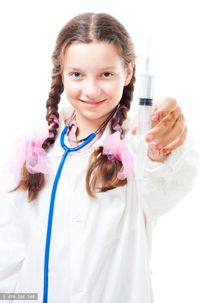 Young girl play doctor with syringe