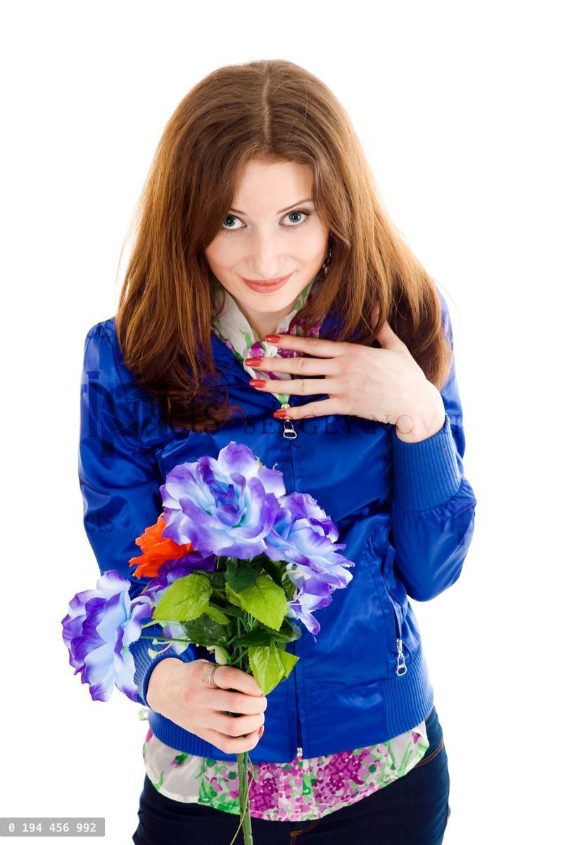 Young woman with blue flowers