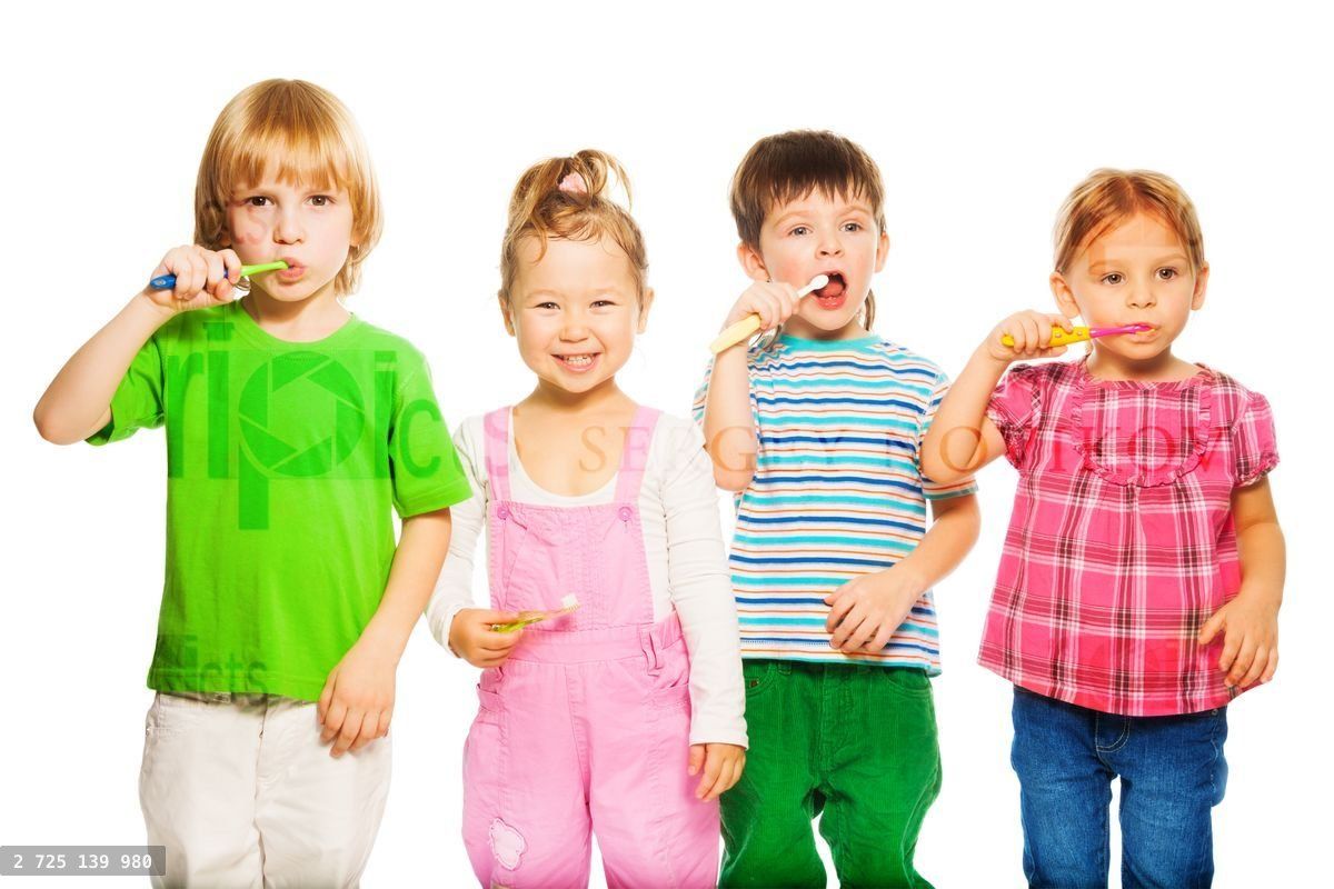 Four kids brushing teeth