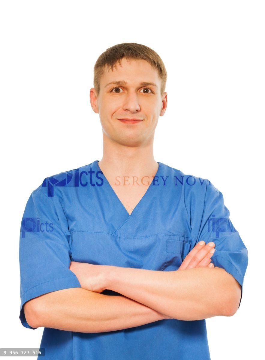 Young masseur in a uniform isolated on white